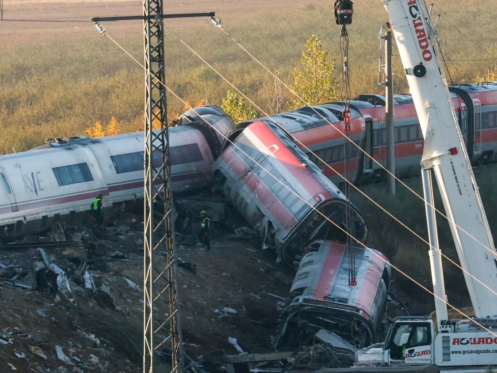 Rescue teams search wreckage for survivors after train crash in Spain
