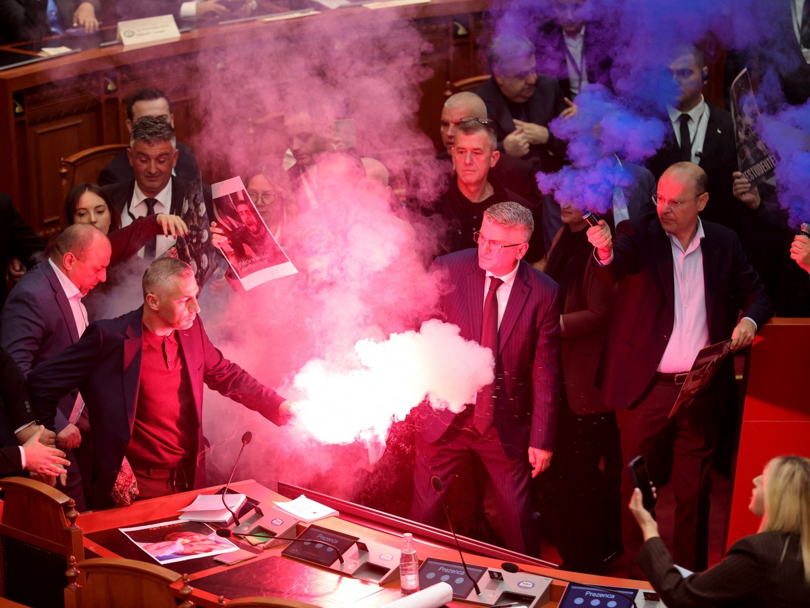 Albanian opposition storms parliament, sets off flares and smoke bombs