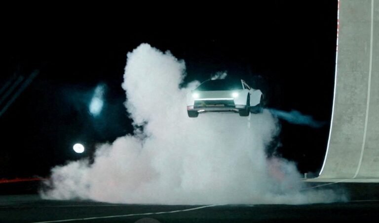 Tesla unveils car that can drive upside down and jump through the air