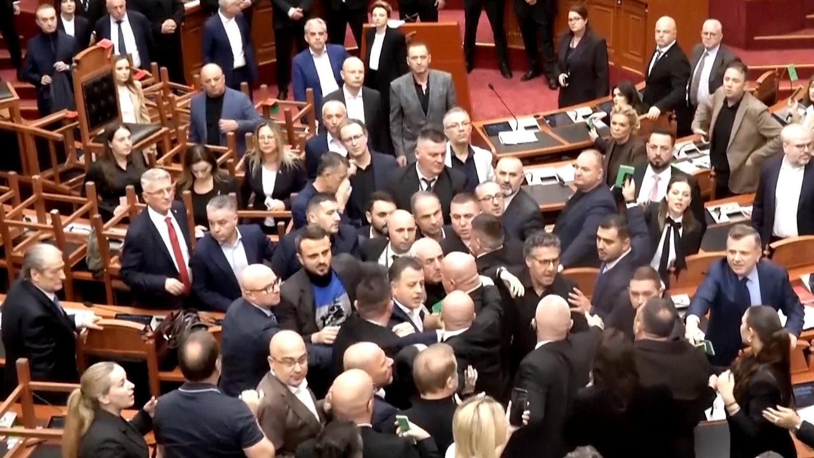 Albanian lawmakers scuffle in parliament as street protests continue