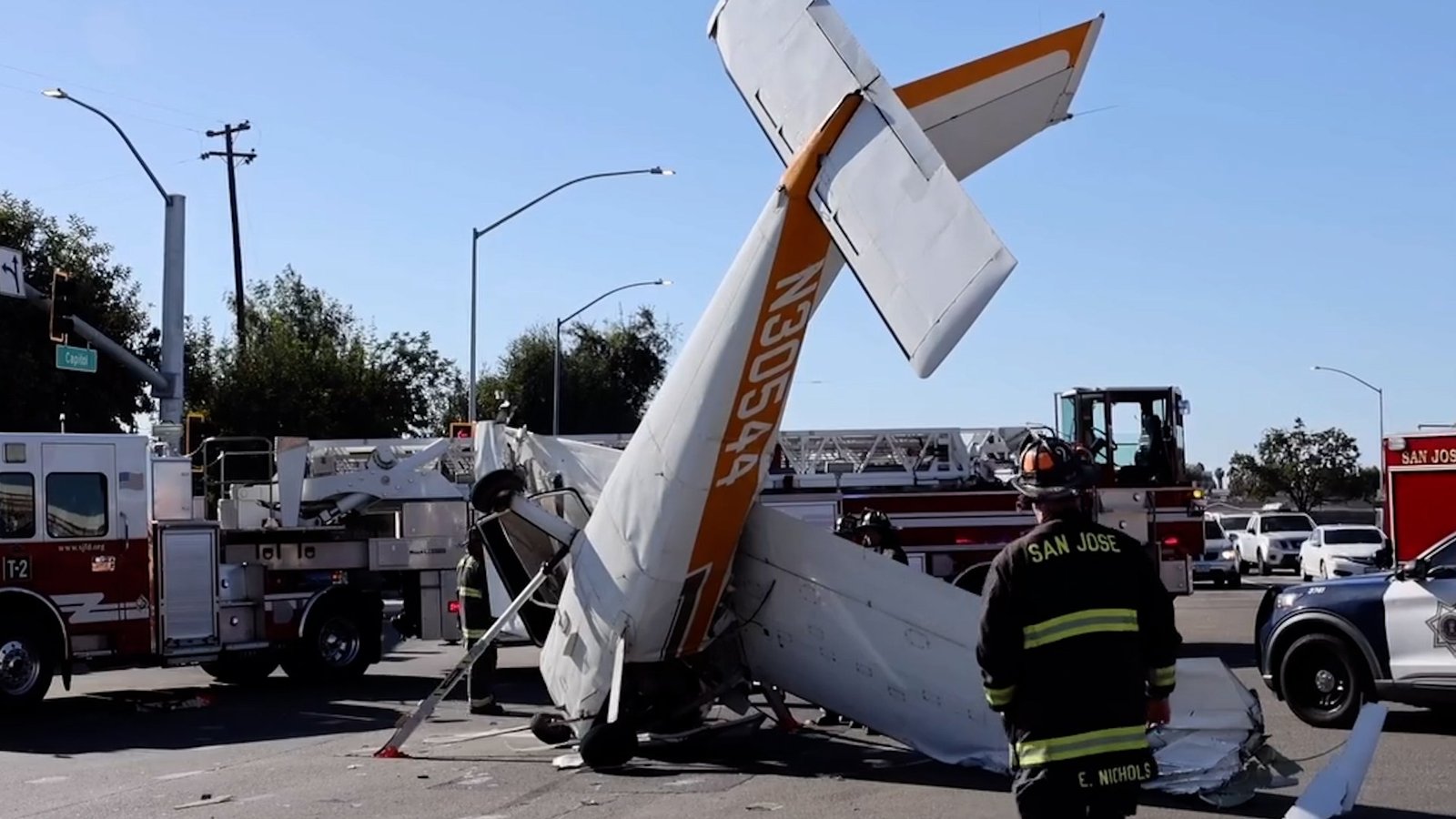 Moment plane crashes on a busy highway in the US